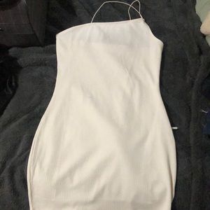 It’s a mini dress never been worn no stains and it’s stretchy